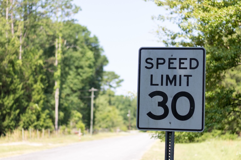 Speed limit sign on a rural roadalt