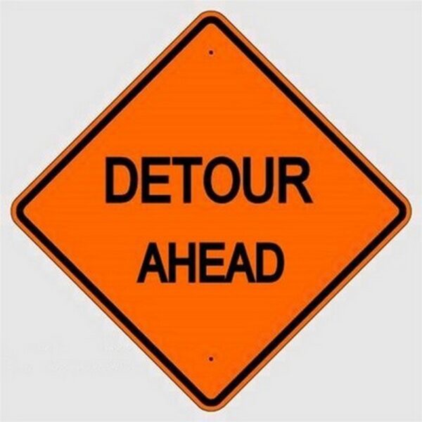 detour ahead work zone sign