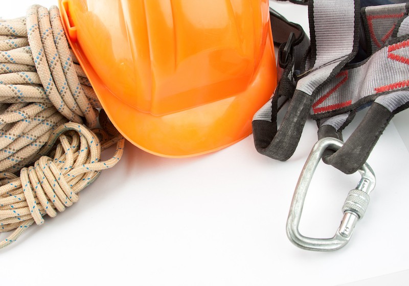 hard hat, fall protection anchor, and rope