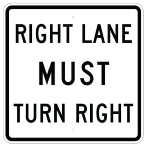 black and white right lane must turn right road sign